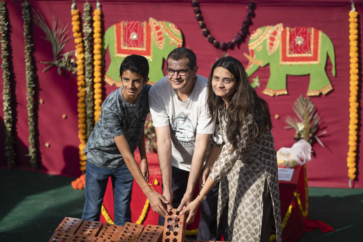 Devotees Place Their Worshiped Bricks