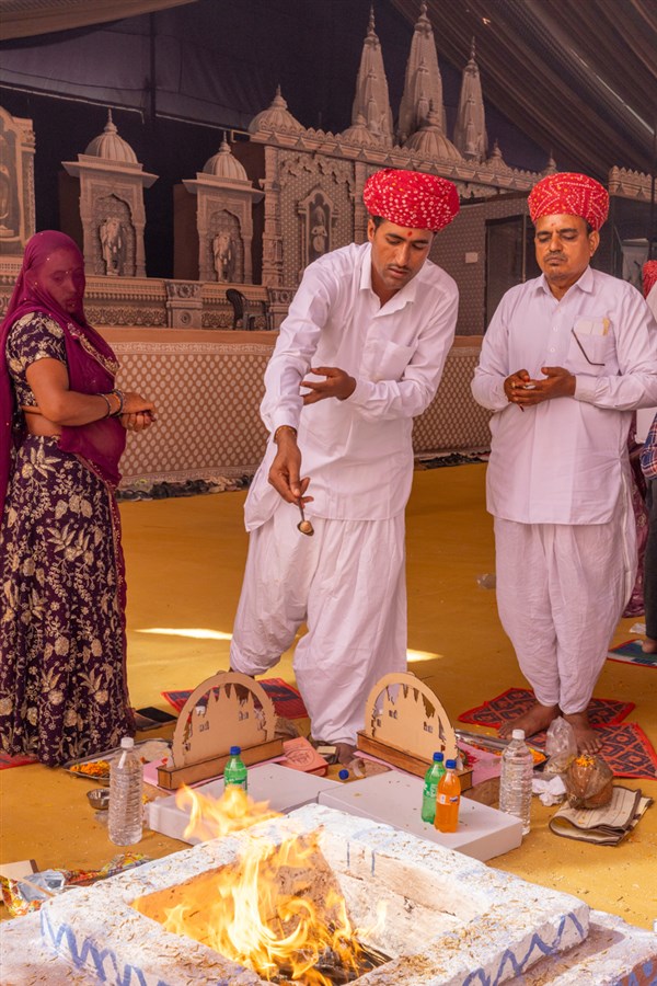 Devotees and well-wishers participate in the yagna rituals