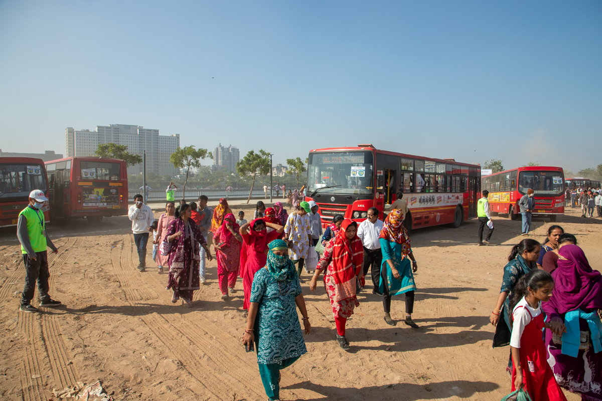 Devotees arrive in buses
