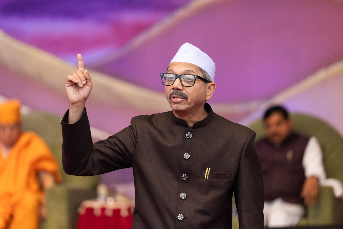 A devotee presents in the assembly