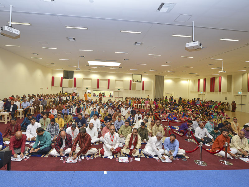 Devotees during the murti-pratishtha mahapuja